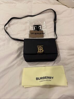 Source Unknown Black Leather Messenger Bag with Gold TB Emblem